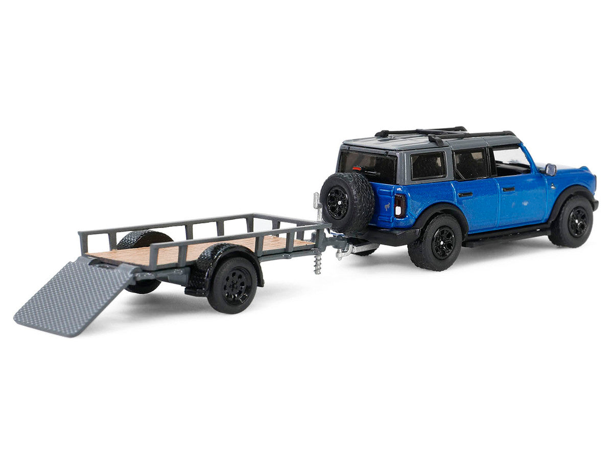 2021 Ford Bronco Black Diamond in Velocity Blue GL32320-C Metallic with Utility Trailer and Motorcycle