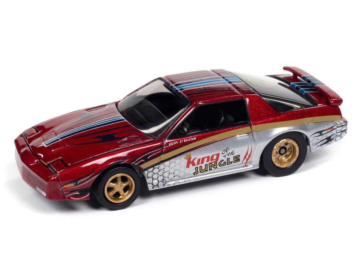 Johnny Lightning-1987 Pontiac Trans Am King of the Jungle (Metallic Red) JLSP385A