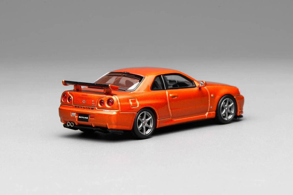 Motorhelix 1:64 Nissan Skyline GT-R (R34) V-Spec II Customized – Metallic Orange – M63471