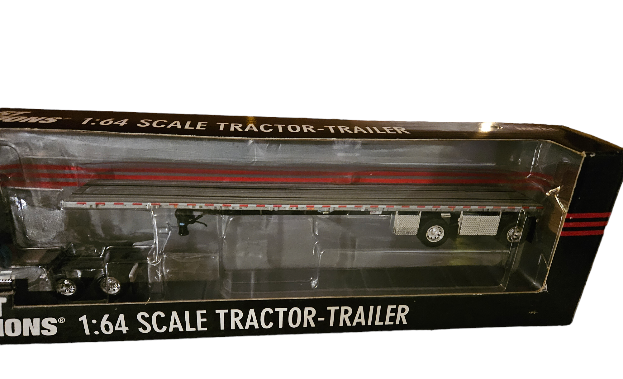 WHITE VOLVO VT800 SEMI CAB TRUCK & SPREAD FLAT BED TRAILER in 1/64