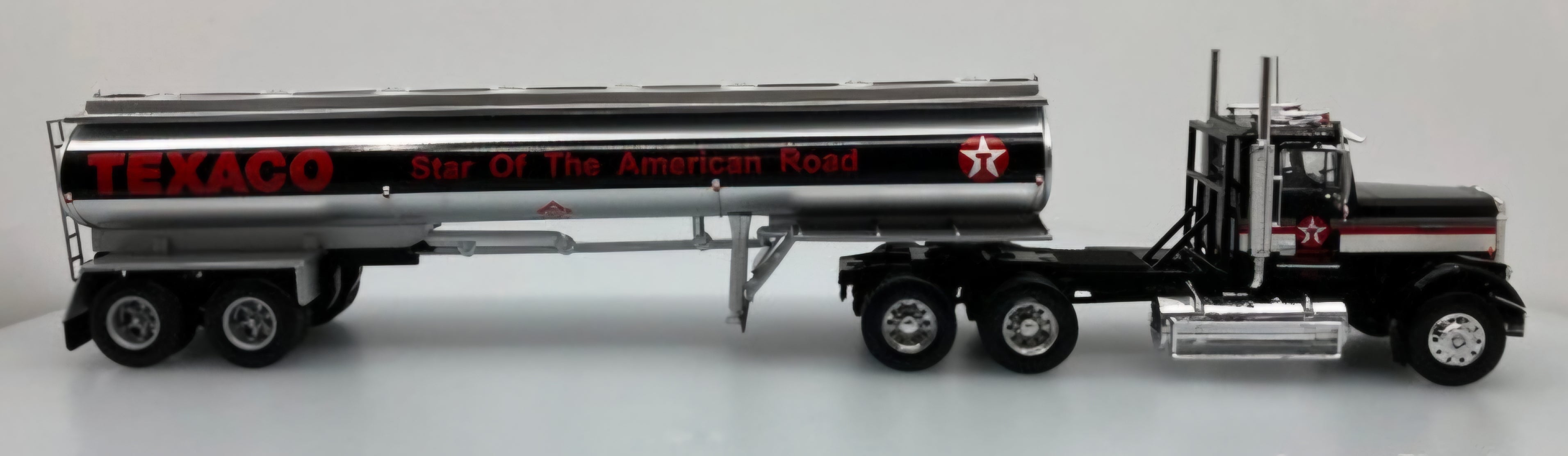 1977 Freightliner FLC 120 64T Day Cab w/Tanker Trailer: Texaco Oil (1/43)