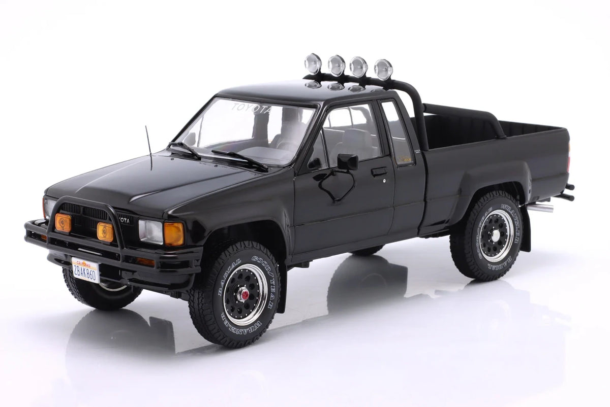 KK Scale 1:18 1985 Toyota Hilux SR5 Xtra Cab 4x4 Black Back to the Future Part II + Marty McFly Figure Bundle KKDC181565-KKFIG024