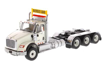 International HX620 Day Cab Tridem Tractor