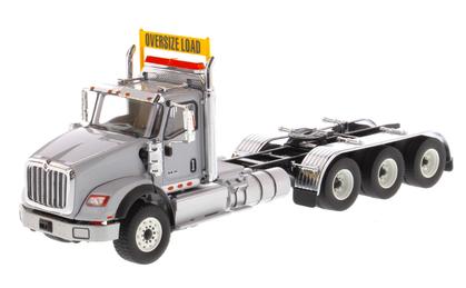 International HX620 Day Cab Tridem Tractor