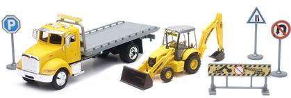Peterbilt Rollback with New Holland Backhoe Loader