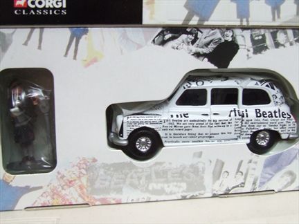 "The Beatles" Newspaper Taxi & Figure