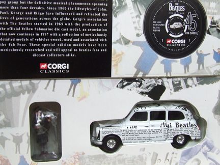 "The Beatles" Newspaper Taxi & Figure