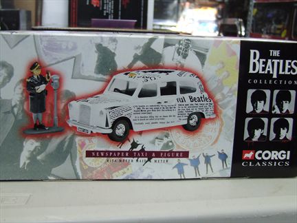 "The Beatles" Newspaper Taxi & Figure