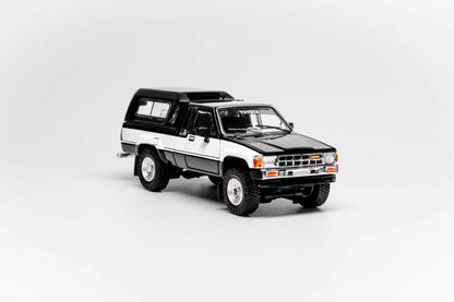 GCD 1:64 1985 Toyota Hilux SR5 Xtra Cab Black (LHD) – KS-087-641