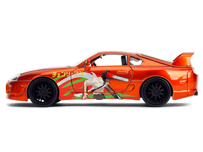 1995 Toyota Supra Orange Metallic with Graphics and Chainsaw Man Diecast Figure "Chainsaw Man" (2022) TV Series
