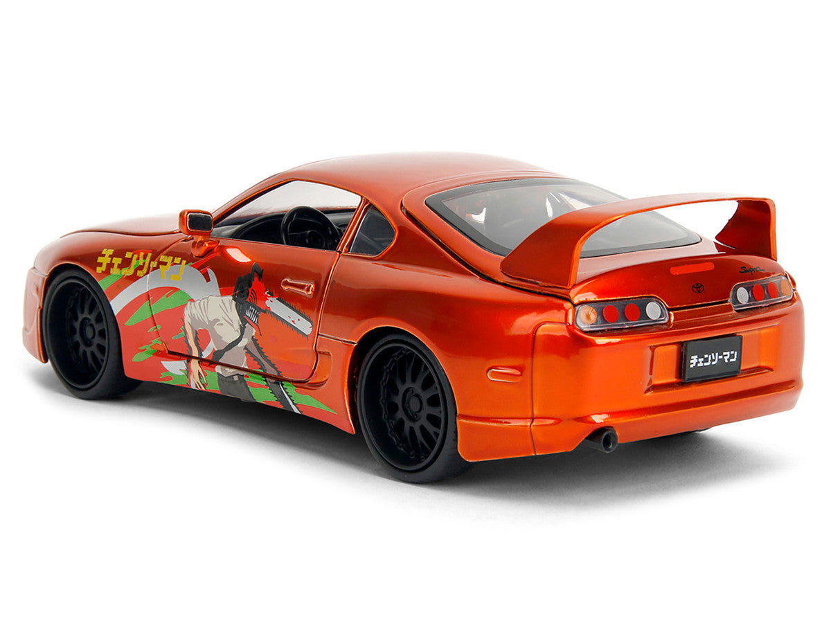 1995 Toyota Supra Orange Metallic with Graphics and Chainsaw Man Diecast Figure "Chainsaw Man" (2022) TV Series