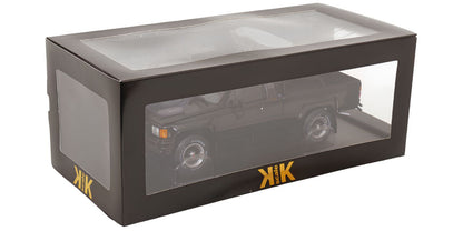 KK Scale 1:18 1985 Toyota Hilux SR5 Xtra Cab 4x4 Black Back to the Future Part II + Marty McFly Figure Bundle KKDC181565-KKFIG024