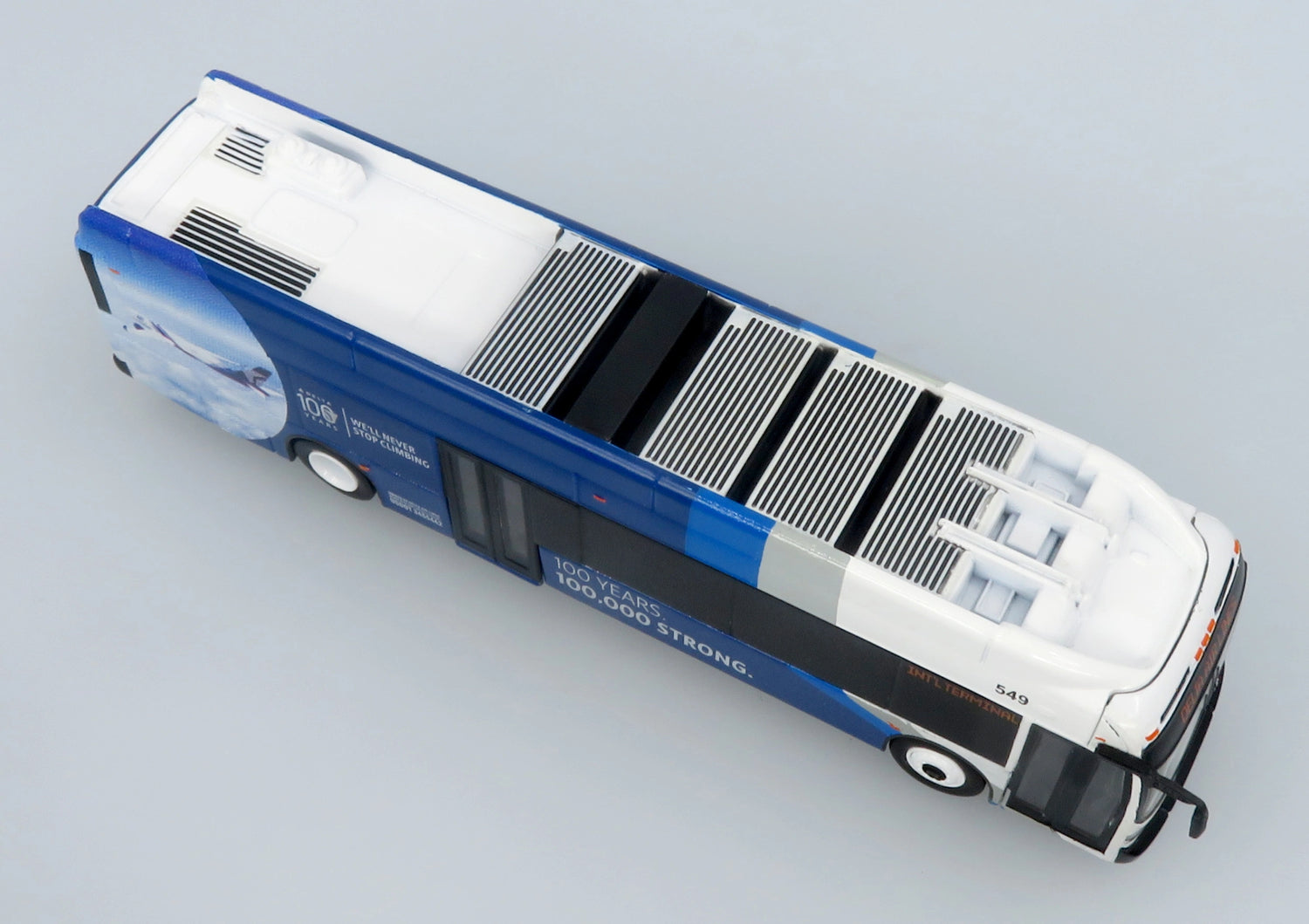 Autobus NFI Xcelsior XN40 Delta 100th Anniversary 1:87 — Iconic Replicas 87-0679