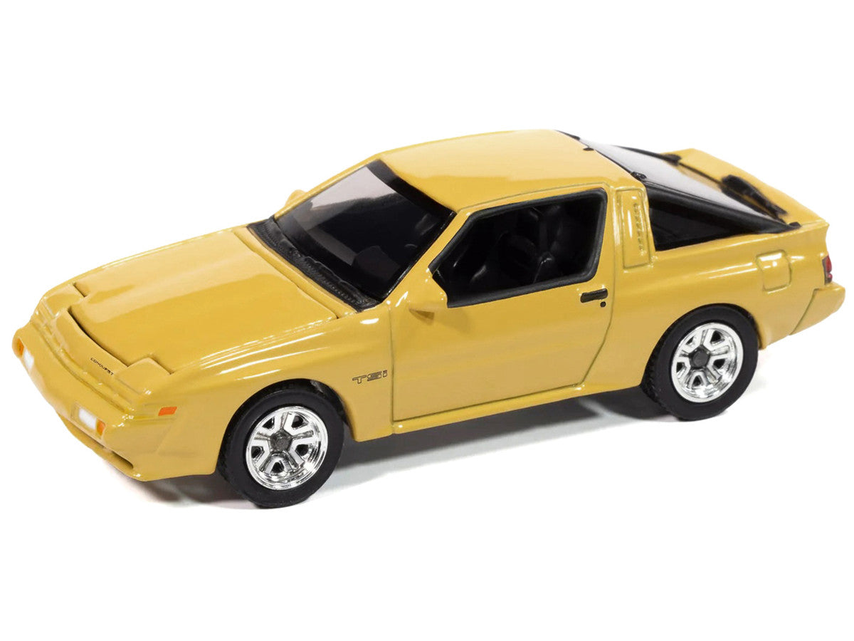 AUTO WORLD - 1988 Chrysler Conquest TSi (San Marino Yellow)