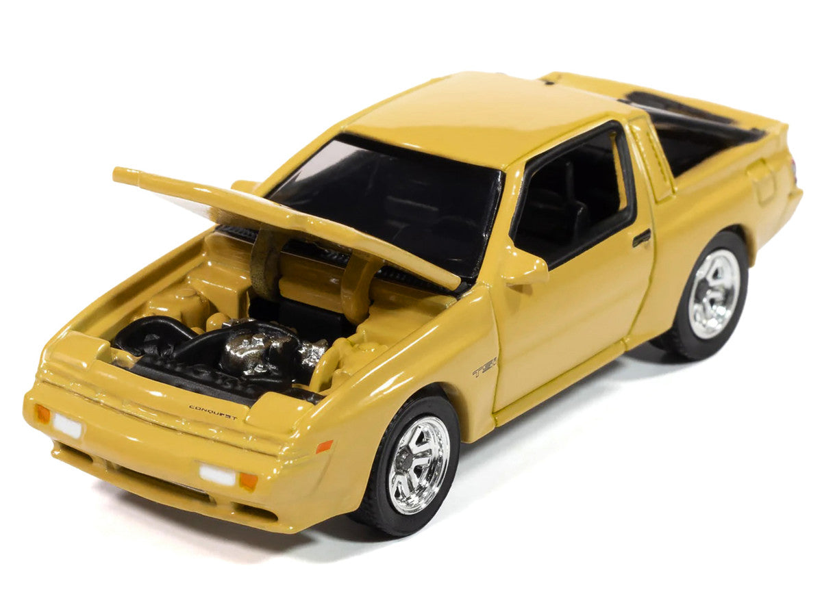 AUTO WORLD - 1988 Chrysler Conquest TSi (San Marino Yellow)