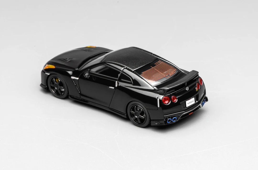Motorhelix 1/64 - Nissan GT-R (R35) Meteor Pearl Black w/Carbon Top - M63517