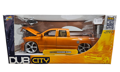 2003 DODGE RAM ORANGE WITH KMC WHEELS, VERSION DUB CITY, 1:24