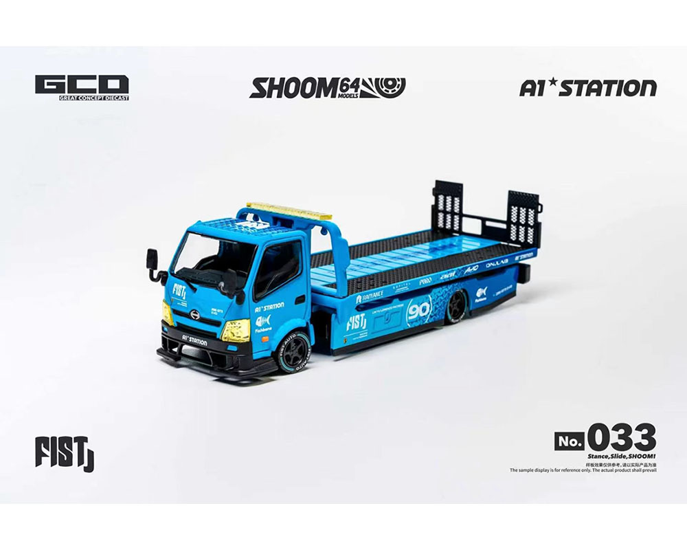 (PRE-ORDER 2027) SHOOM64 1:64 FIST TEAM Hino 300 Custom Drop-Bed Car Carrier – Blue – Special Edition SHOOM-10-033