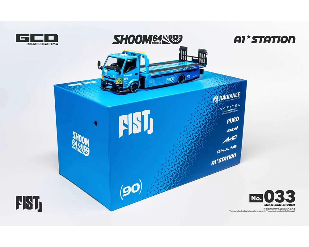 (PRE-ORDER 2027) SHOOM64 1:64 FIST TEAM Hino 300 Custom Drop-Bed Car Carrier – Blue – Special Edition SHOOM-10-033