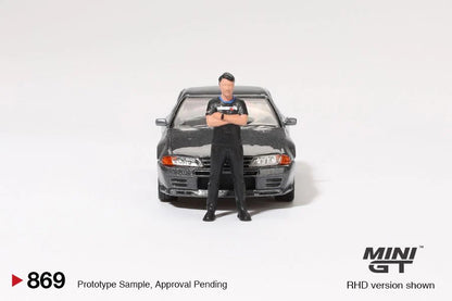 MINI GT-Nissan Skyline GT-R (R32) Nismo Gunmetal w/ Matsuda Figure MGT00869-R