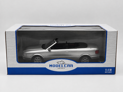 Audi Cabriolet 1991 argent – Model Car Group 1:18 – MCG181225