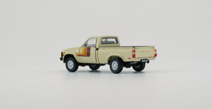 BM CREATIONS 1/64 - 1980 Toyota Hilux (RHD) - Beige - 64B0225