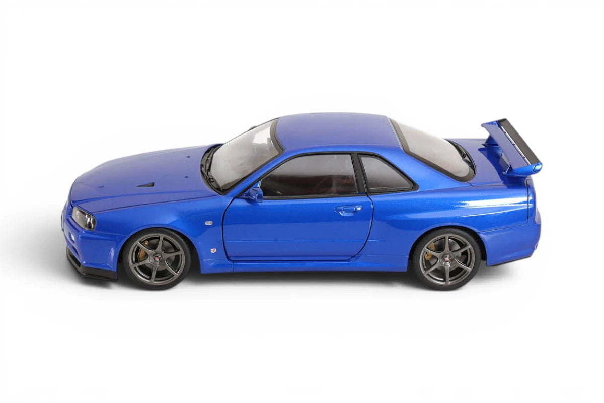 KK-Scale 1:12 Nissan Skyline GT-R (R34) V-Spec II 2001 Jantes OEM – Bleu Métallisé – KKDC120211-1