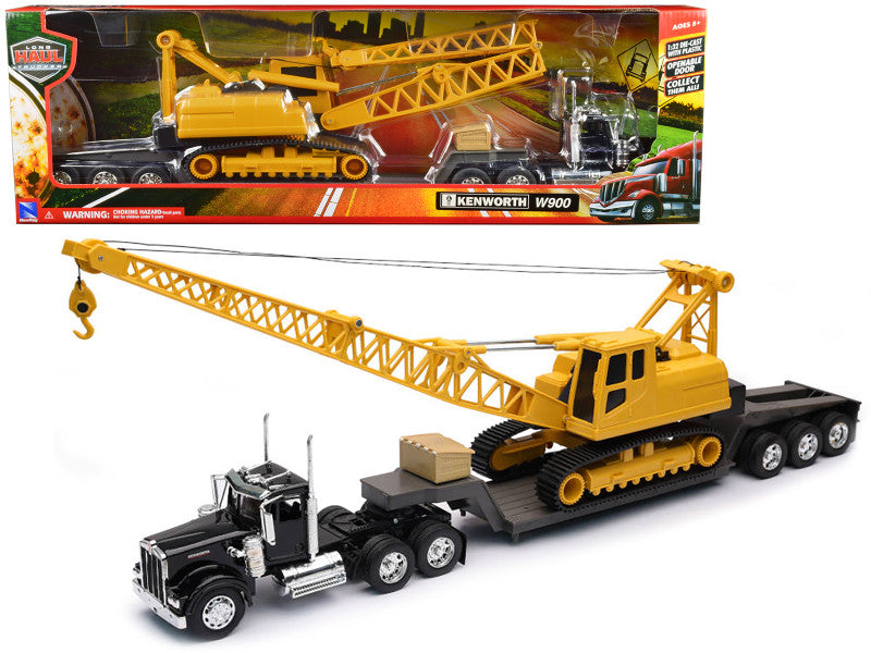 Kenworth W900 avec remorque surbaissée transportant une grue sur chenilles