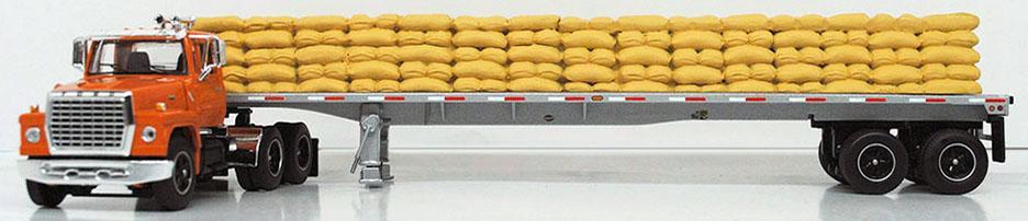 Ford Louisville LN9000 Tractor w 48′ Utility Flatbed Trailer w Sack Load