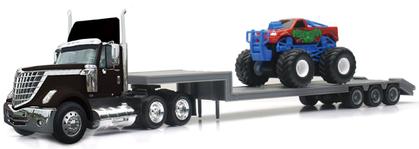 International Lonestar with Lowboy Trailer Hauling a Monster Truck