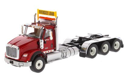 International HX620 Day Cab Tridem Tractor
