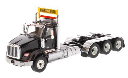 International HX620 Day Cab Tridem Tractor