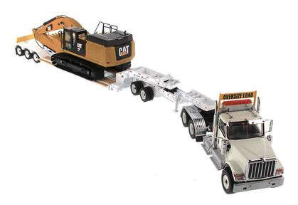International HX520 Tandem Day Cab Tractor with XL 120 HDG Lowboy Trailer and Cat 349F L XE Hydraulic Excavator