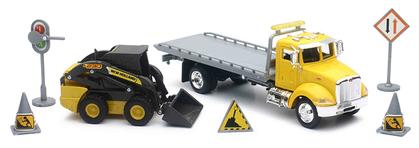 Peterbilt Roll-Off Truck with New Holland Skid Steer and Accessories