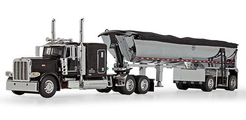 Peterbilt Model 389 with 63" Flattop Sleeper in Black and MAC Half Round End Dump Spread-Axle Trailer