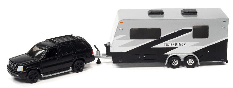 2005 Cadillac Escalade in Matte Black with Camper Trailer